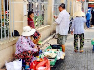 fliegender Händler in Ho Chi Minh Stadt